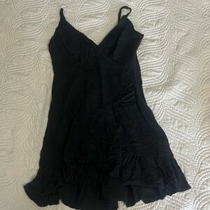 Black, womens mini dress with ruffling detail and stretchy back